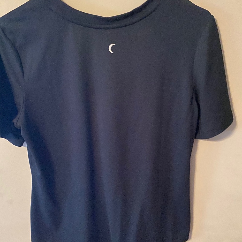 Black, pocket tee. Worn a few times.